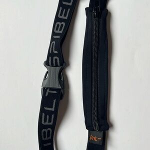 Spibelt personal item belt for running or travel.
